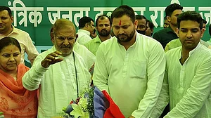 شرد یادو کی پارٹی کا آر جے ڈی میں انضمام، تیجسوی کا اپوزیشن کو متحد کرنے پر زور