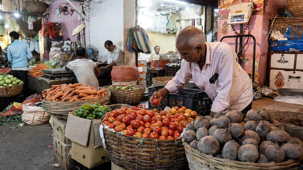 <div class="paragraphs"><p>گوہاٹی کے بازار میں سبزیوں کی فروخت / Getty Images</p></div>