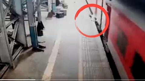 Man Trying To Catch Running Train