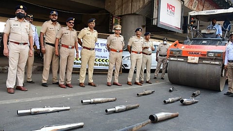 Modified silencer smashed by bandra traffic police