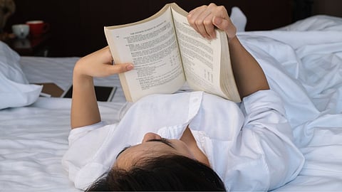 Reading Book Before Going Bed 