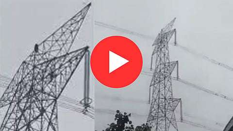 Woman Climbs Electricity Tower