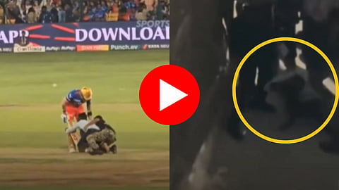 Shocking news virat kohli fan who touched virat's feet during rcb vs pbks match beaten by security guards video viral amd2000