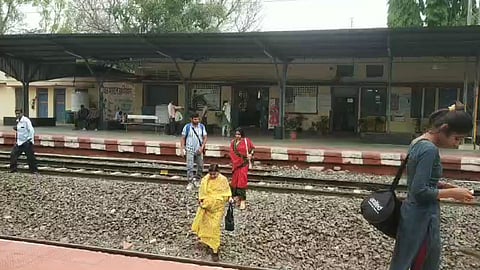 passengers crosses railway line carelessly in koregaon