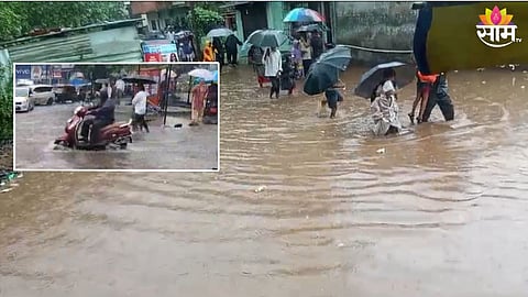 अवघ्या तासाभराच्या पावसानं कल्याण झालं जलमय, विद्यार्थ्यांना गुडघाभर पाण्यातून काढावी लागली वाट