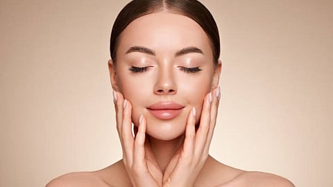 Applying Multani Mitti on Face