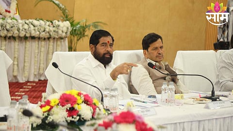 Minister Ganesh Naik addressing media over Navi Mumbai land allocation controversy.