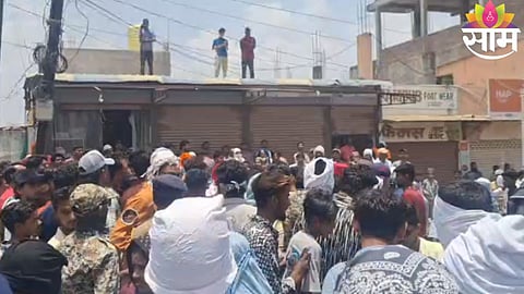 Police disperse an aggressive crowd during a violent anti-encroachment drive in Nanded.