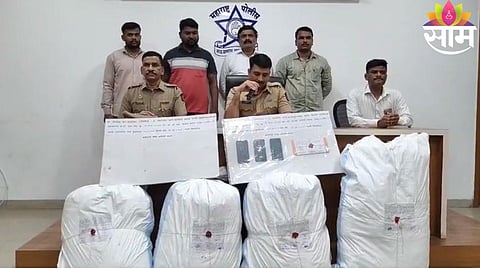Police display seized 107 kg of ganja worth ₹21.4 lakh after a major anti-narcotics operation in Kalyan.