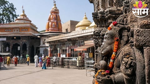 Devotees gather outside an Ashtavinayak temple as authorities announce temporary closure for restoration work