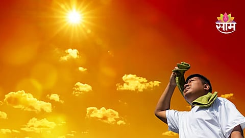 People shield themselves from the blazing sun as temperatures soar during a severe heatwave in Maharashtra.