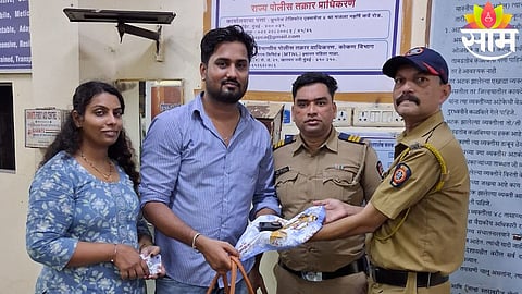 Andheri Railway Police hand over a recovered bag containing gold jewellery and a DSLR camera worth ₹10.95 lakh to the rightful commuter.