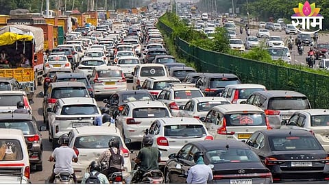 Devotees walk along the highway during the Sant Dnyaneshwar Maharaj Palkhi procession as traffic diversions are enforced in Pune rural.