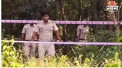Police and forensic teams investigate the crime scene where a tribal woman was found dead in a field near a canal in East Burdwan.
