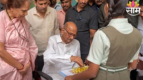 Sharad Pawar engages in a friendly chess match with students during his visit to Vidya Pratishthan School in Baramati.