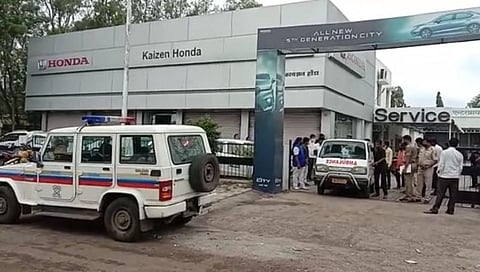 The dead body of a young man was found in a water tank in a Honda showroom