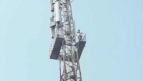 Unique agitation as the youth climbed the mobile tower for the damaged road