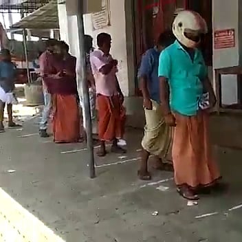 viral satya people maintain distance while standing wineshop
