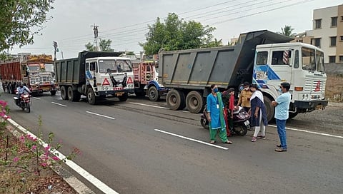 Women talathi Nisha Pawra while inspecting a sand truck