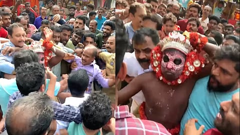 തെയ്യം കെട്ടിയ ആളെ നാട്ടുകാര്‍ ആക്രമിക്കുന്നു