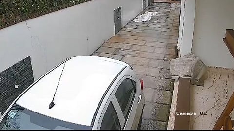 wall collapsed in heavy rain car crashed; CCTV footage 
