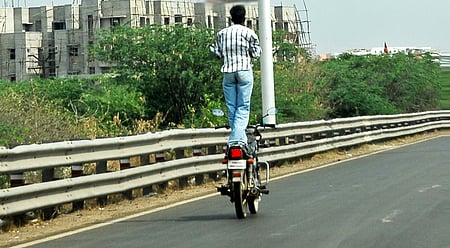Hands-free two-wheeler driving stunts are set to be banned by the central government