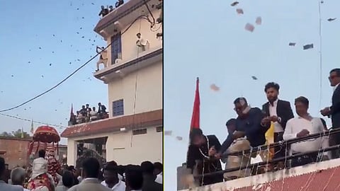 കല്യാണ ഘോഷയാത്രക്കിടെ നോട്ടുകെട്ടുകള്‍ വാരിയെറിയുന്നു
