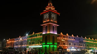  The clock tower at Lal Chowk illuminated with tri-colour lights on the eve of Republic Day,