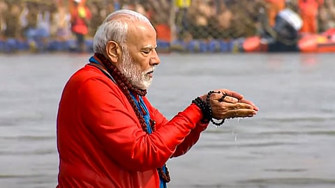  PM taking holy dip in Sangam