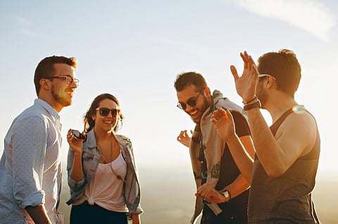 friends enjoying in mountain top