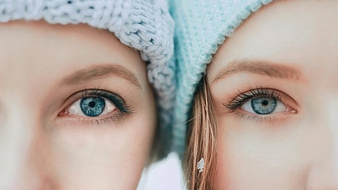 Image of two women's eyes focused 