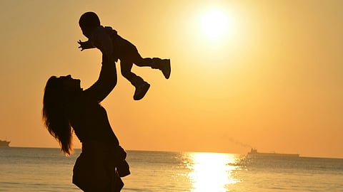 Mother holding child