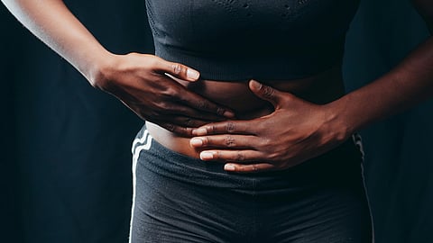A lady suffering from Abdominal pain