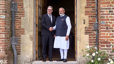 Narendra Modi, Keir Starmer 