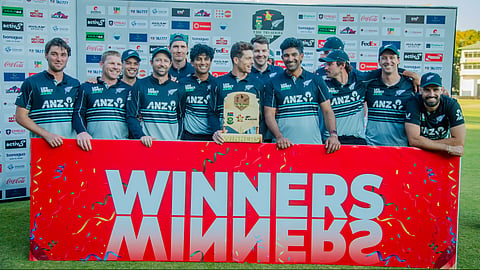 New Zealand team with the T20 Tri-Nation Series trophy