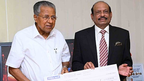 MA Yusuf Ali and Pinarayi vijayan 