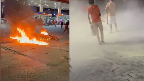 A young man set a  motorcycle on fire at a petrol pump in Aluva
