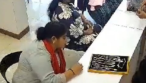 Police arrested a woman who stole a gold necklace from a jewelry 