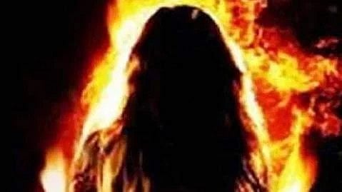 Elderly woman sets herself on fire