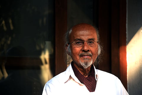 Image of TJS George