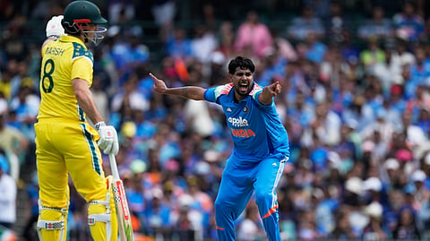 Harshit Rana, right, appeals for a LBW decision against Australia 