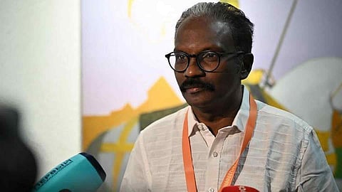 Dr Biju