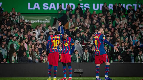 Lamine Yamal and Rafinha celebrate a goal