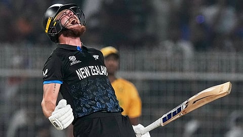 New Zealand's Finn Allen reacts after hitting the winning runs and finishing his century during the first T20 World Cup cricket semifinal 