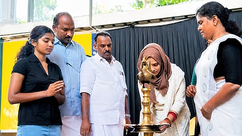 MLA Fathima Thahiliya lighting the lamp at an inaugural programme held in Perambra recently