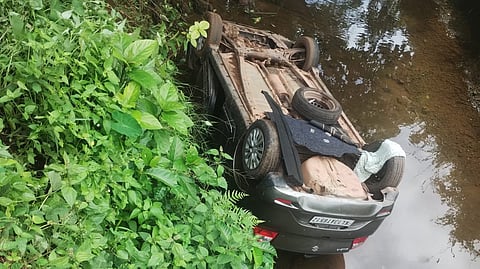 Couples car overturns into canal