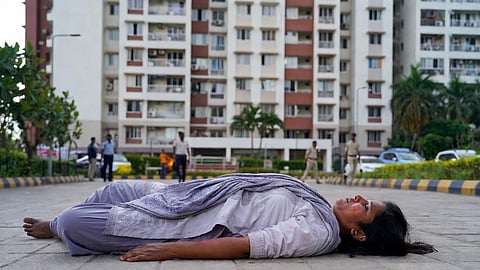 Woman dies after jumping from sixth floor with six-month-old baby; baby miraculously survives