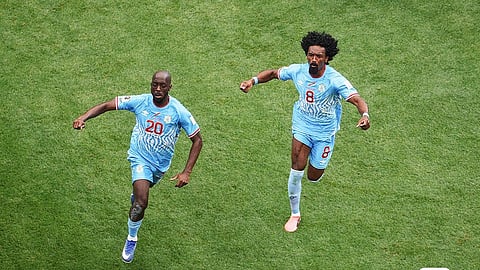 Congolese player Yovan Vissa (20) celebrates scoring a goal.