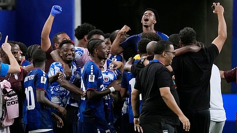 Cape Verde celebrates their 0-0 draw against Saudi Arabia after the World Cup Group H soccer match 