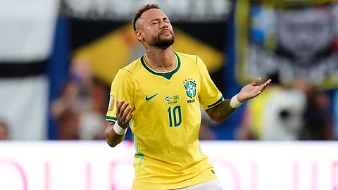 Brazil's Neymar (10) reacts as he takes the field during the World Cup Group C soccer match between Scotland and Brazil 